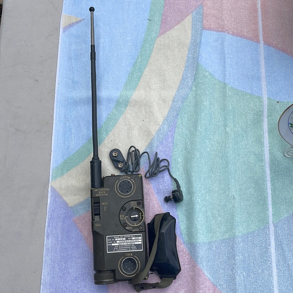 Vintage, military hand radio with ear piece. 1940s.